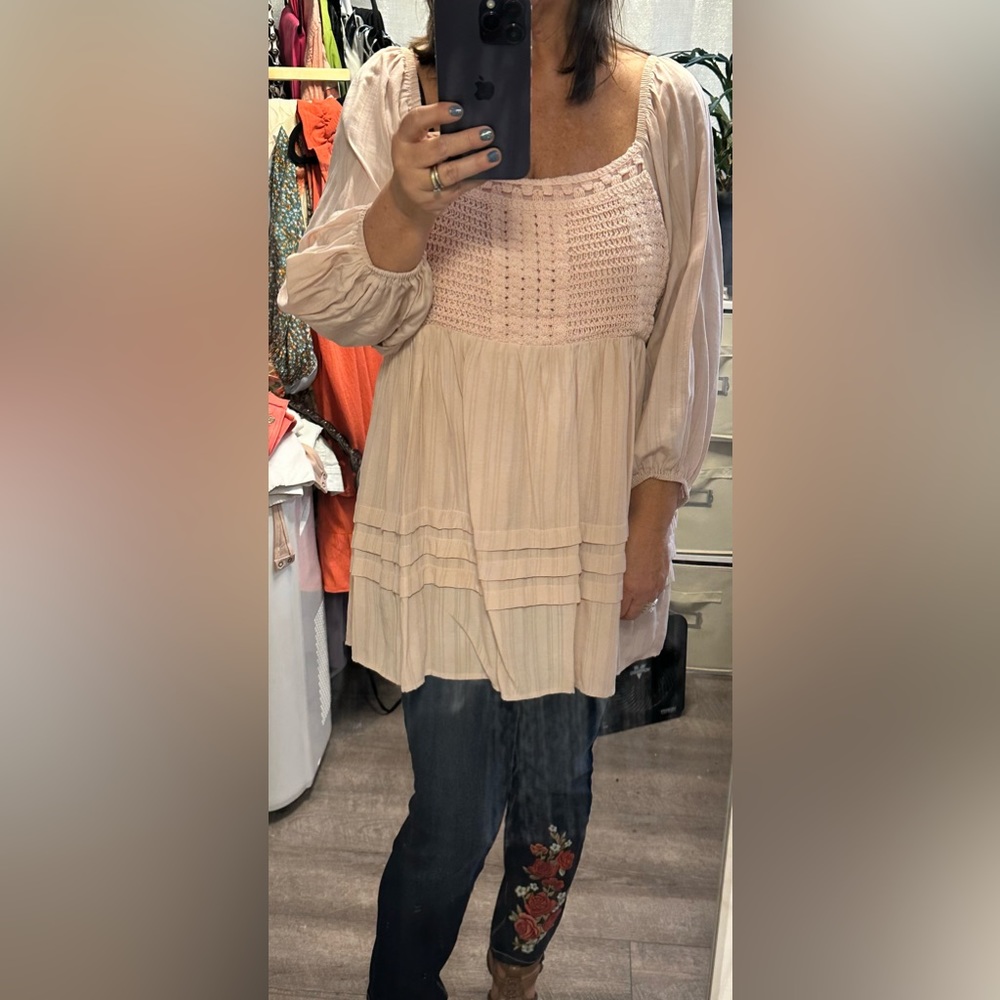 Long sleeve pink babydoll top.